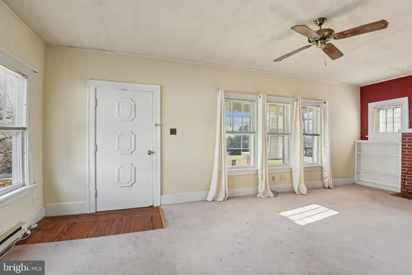 an empty room with windows