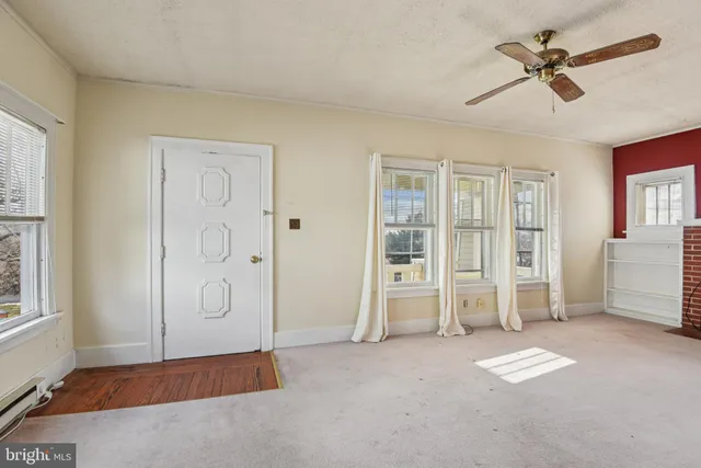 an empty room with windows