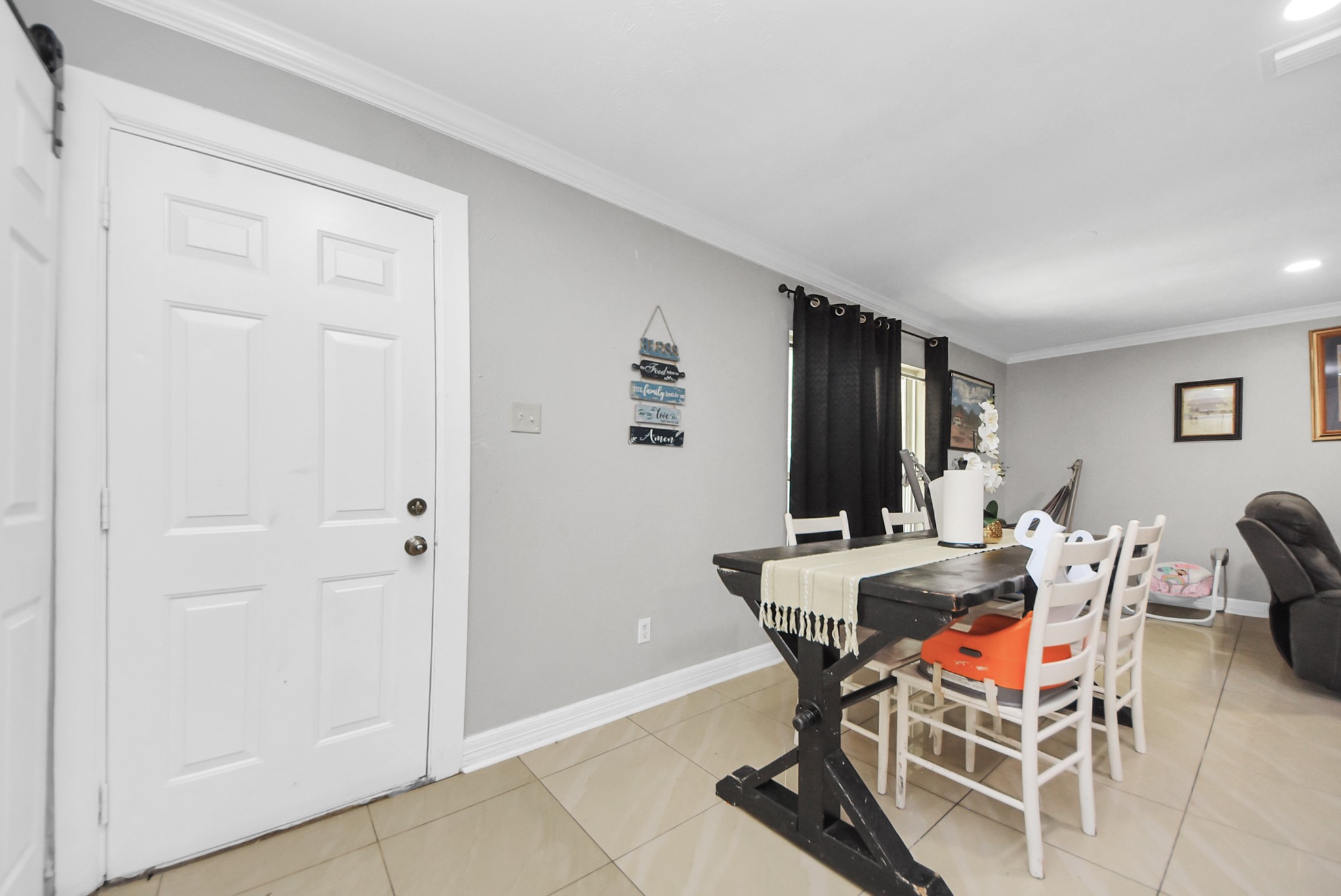 4815 Prairie Ridge Road Houston, TX 77053 - Photo 16 of 44 a dining room with furniture and wooden floor