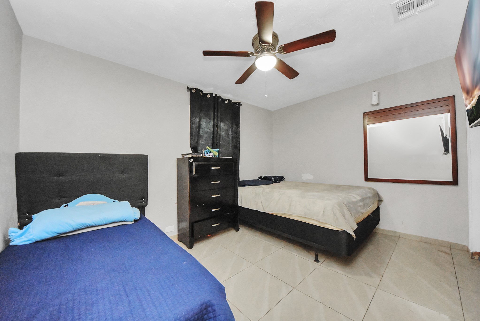 4815 Prairie Ridge Road Houston, TX 77053 - Photo 22 of 44 a bedroom with a bed and window