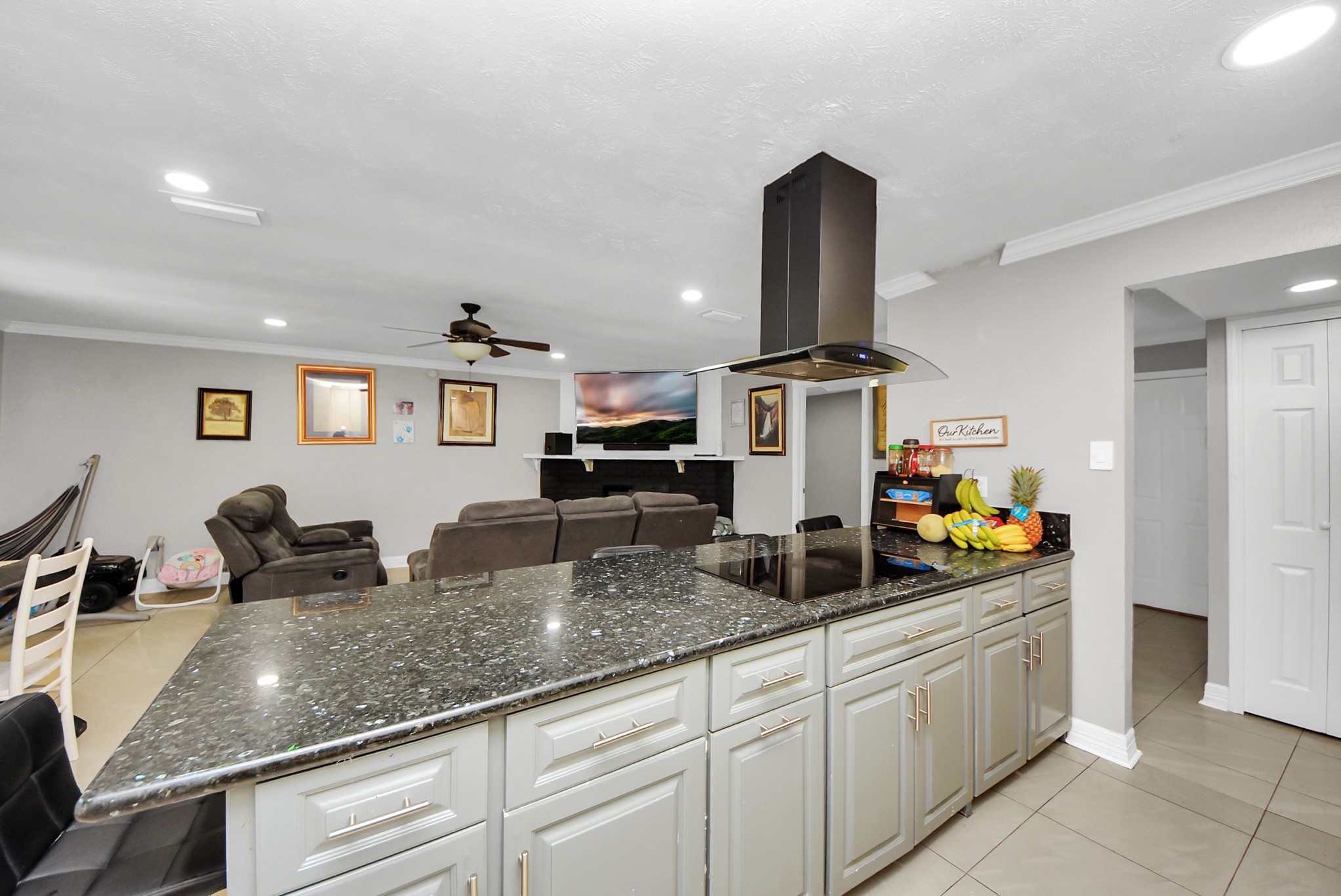 4815 Prairie Ridge Road Houston, TX 77053 - Photo 3 of 44 a kitchen with stainless steel appliances granite countertop a sink and white cabinets