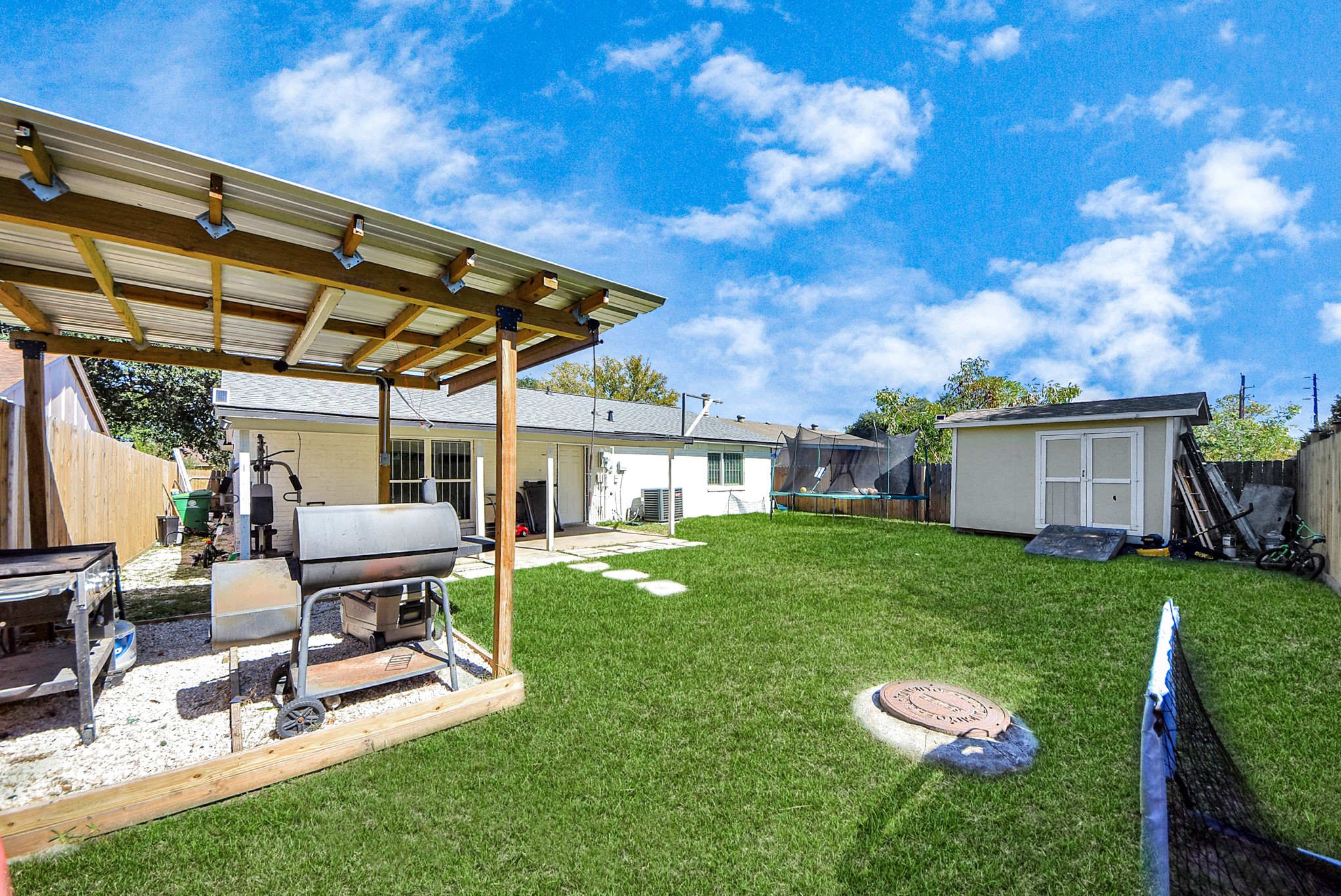4815 Prairie Ridge Road Houston, TX 77053 - Photo 38 of 44 a view of a house with backyard sitting area and garden