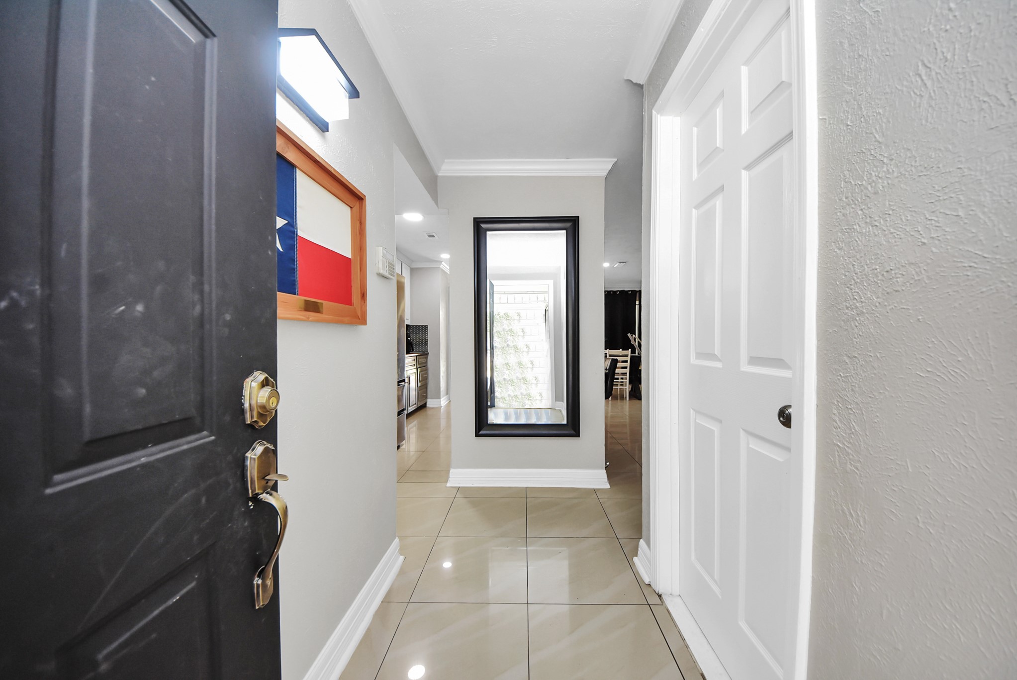 4815 Prairie Ridge Road Houston, TX 77053 - Photo 7 of 44 a view of a hallway with front door