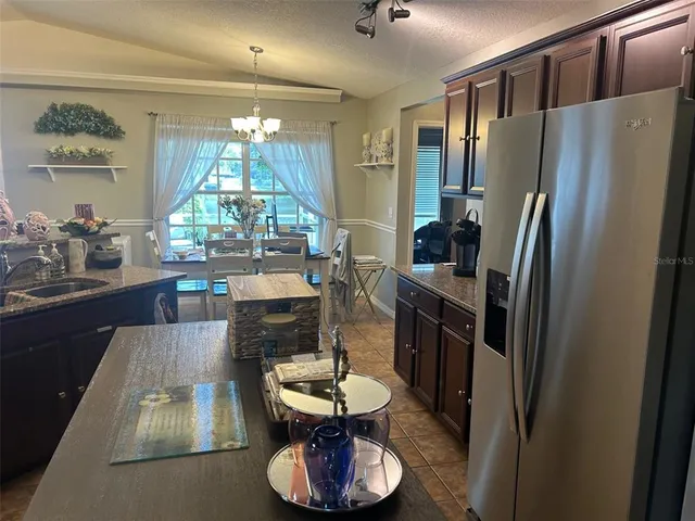 an aerial view of residential house with outdoor space