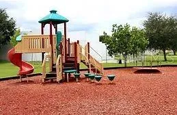 a view of a patio with table and chairs