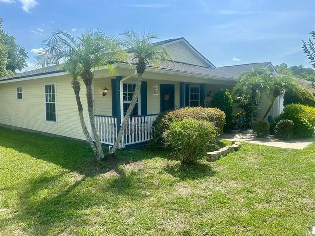 a view of a backyard with a garden