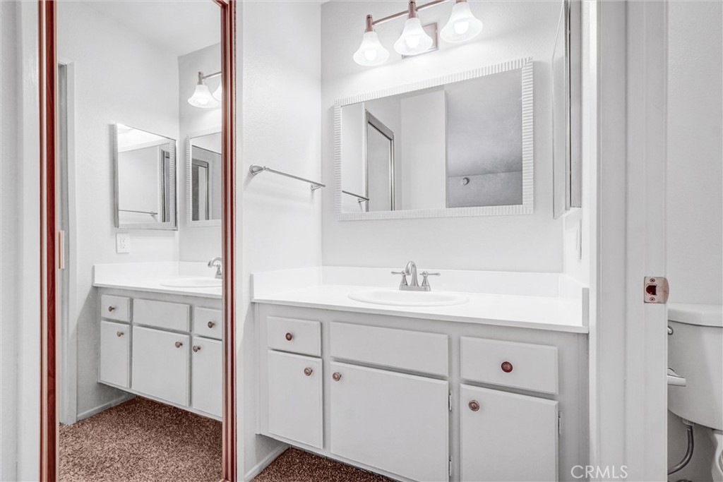 27122 Valleymont Road Lake Forest, CA 92630 - Photo 16 of 35 a bathroom with a sink and a mirror