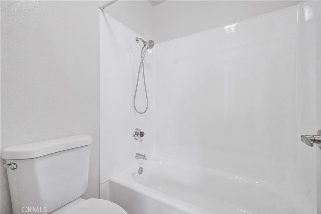 27122 Valleymont Road Lake Forest, CA 92630 - Photo 18 of 35 a bathroom with a shower and a toilet