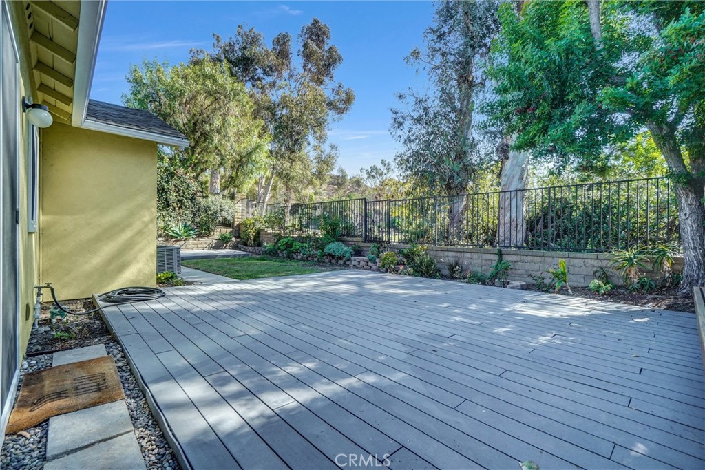 27122 Valleymont Road Lake Forest, CA 92630 - Photo 26 of 35 a view of a backyard with wooden floor