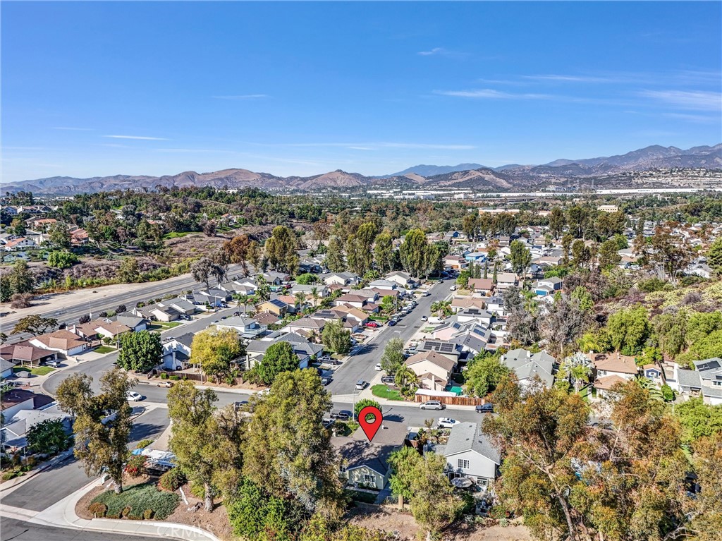27122 Valleymont Road Lake Forest, CA 92630 - Photo 33 of 35 an aerial view of residential house with outdoor space and trees