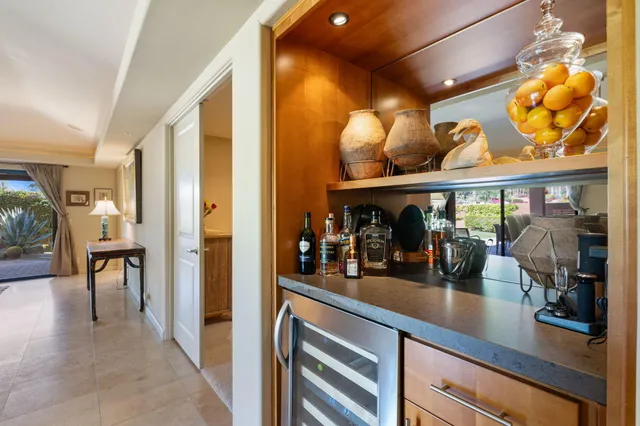 a view of a lobby with dining area and wooden floor