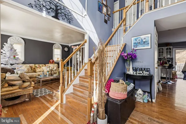 a view of entryway livingroom and hall