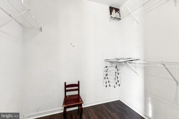 a view of a room with racks on the wall