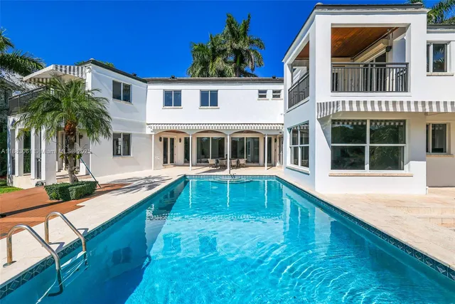 a house view with a garden space