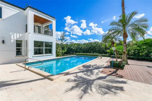 a view of a house with swimming pool