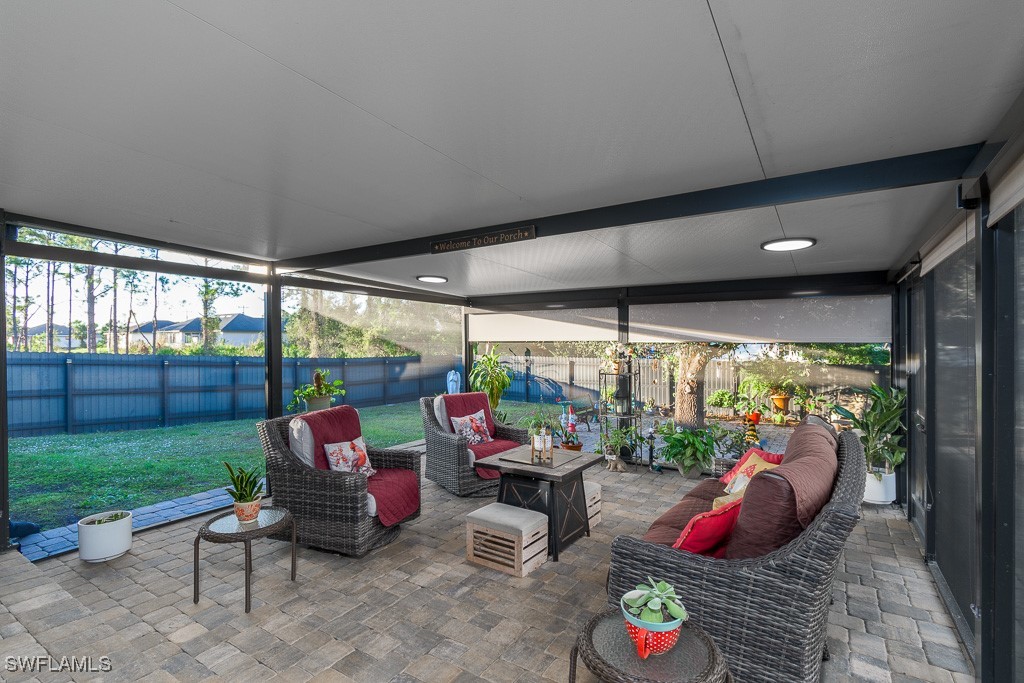 2808 9th Street Southwest Lehigh Acres, FL 33976 - Photo 15 of 34 a outdoor space with furniture and garden view