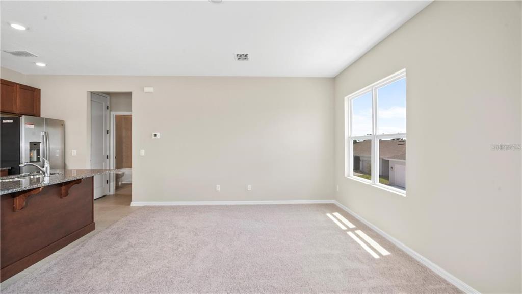 3131 Voyager Avenue St. Cloud, FL 34771 - Photo 2 of 9 a view of an empty room with a window