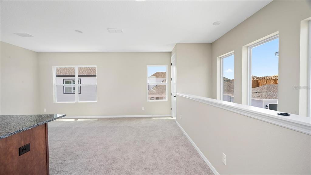 3131 Voyager Avenue St. Cloud, FL 34771 - Photo 3 of 9 a view of an empty room with a window