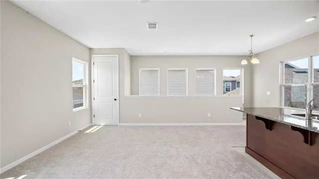 a view of kitchen with windows