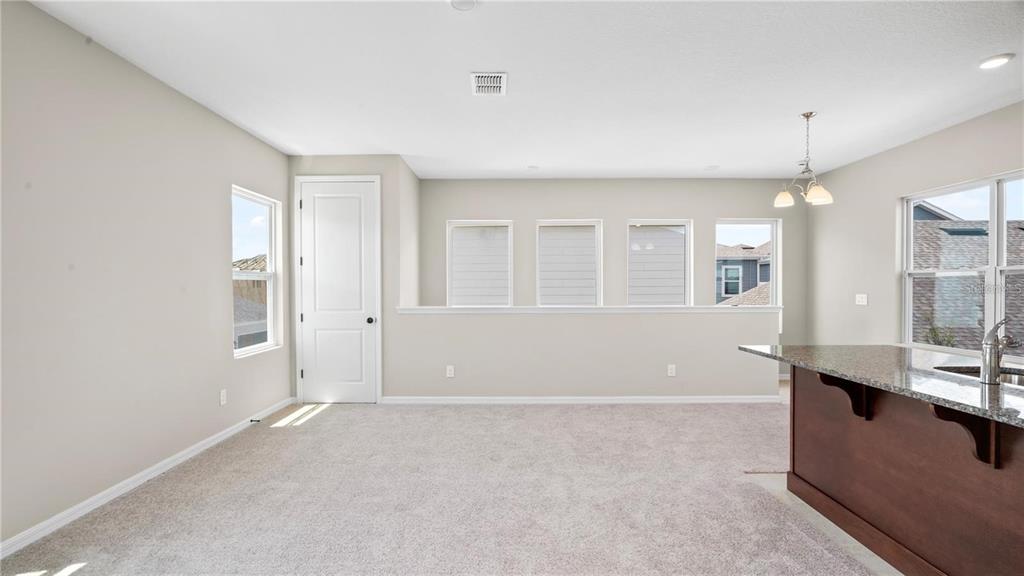 3131 Voyager Avenue St. Cloud, FL 34771 - Photo 4 of 9 a view of kitchen with windows