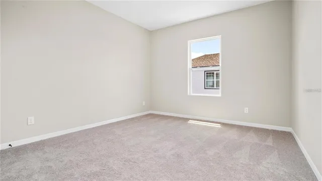 an empty room with a window