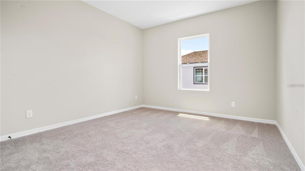 3131 Voyager Avenue St. Cloud, FL 34771 - Photo 9 of 9 an empty room with a window