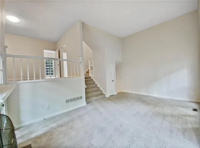 an empty room with windows