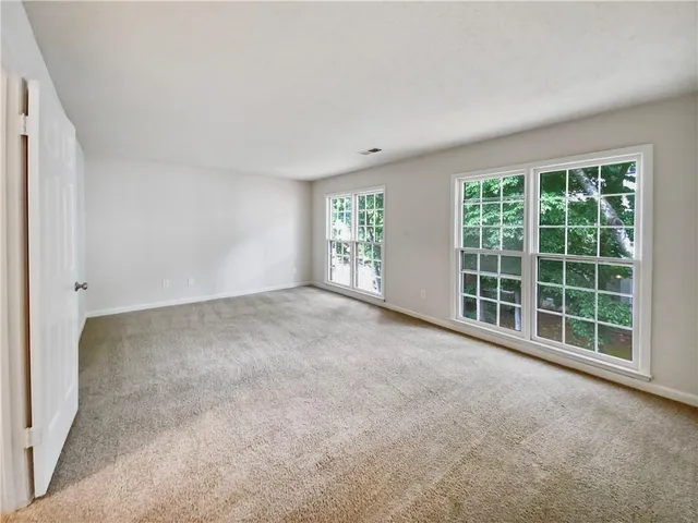 an empty room with windows