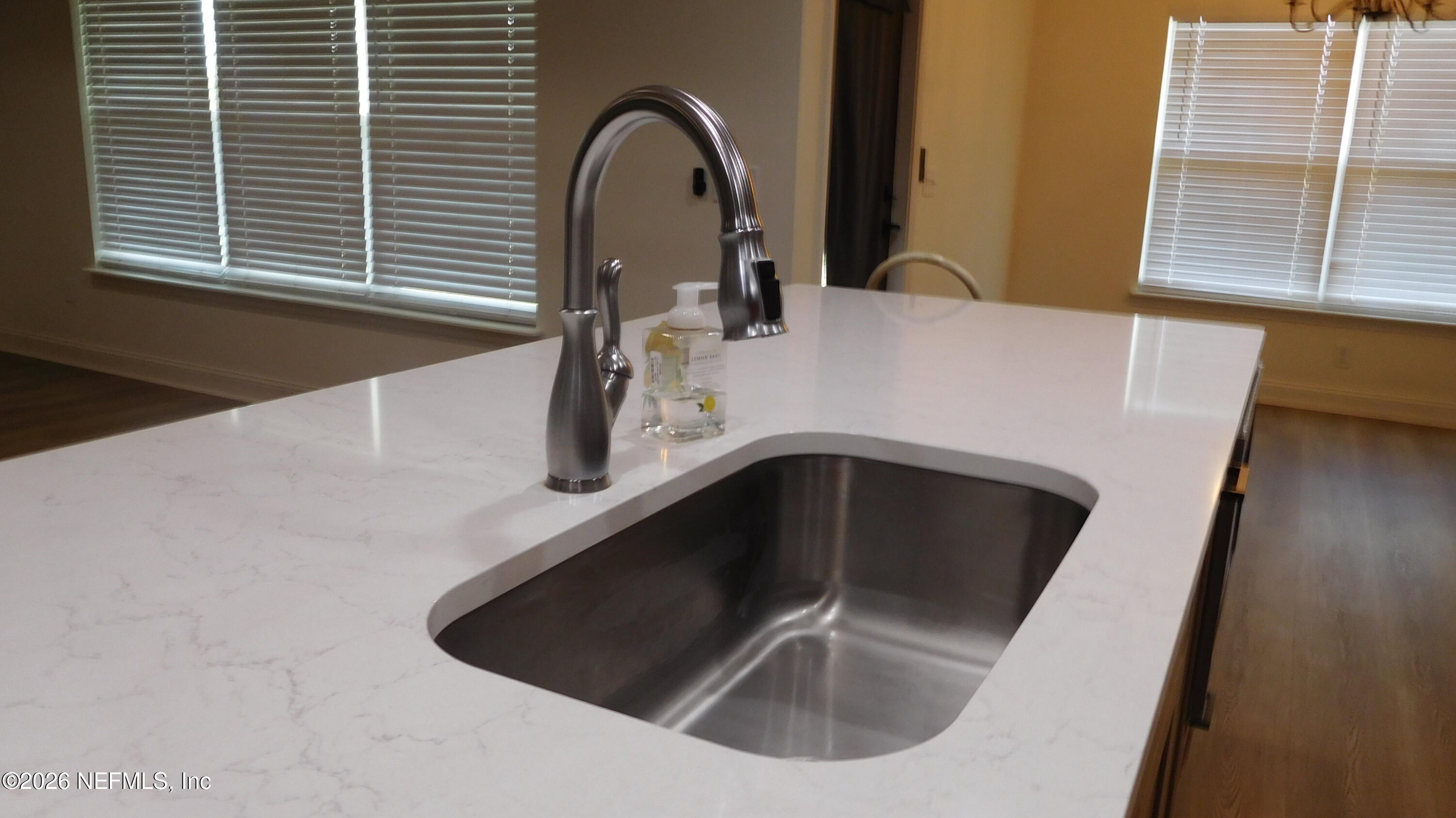 8685 Odis Yarborough Road Glen St. Mary, FL 32040 - Photo 16 of 59 a kitchen with a sink and a window
