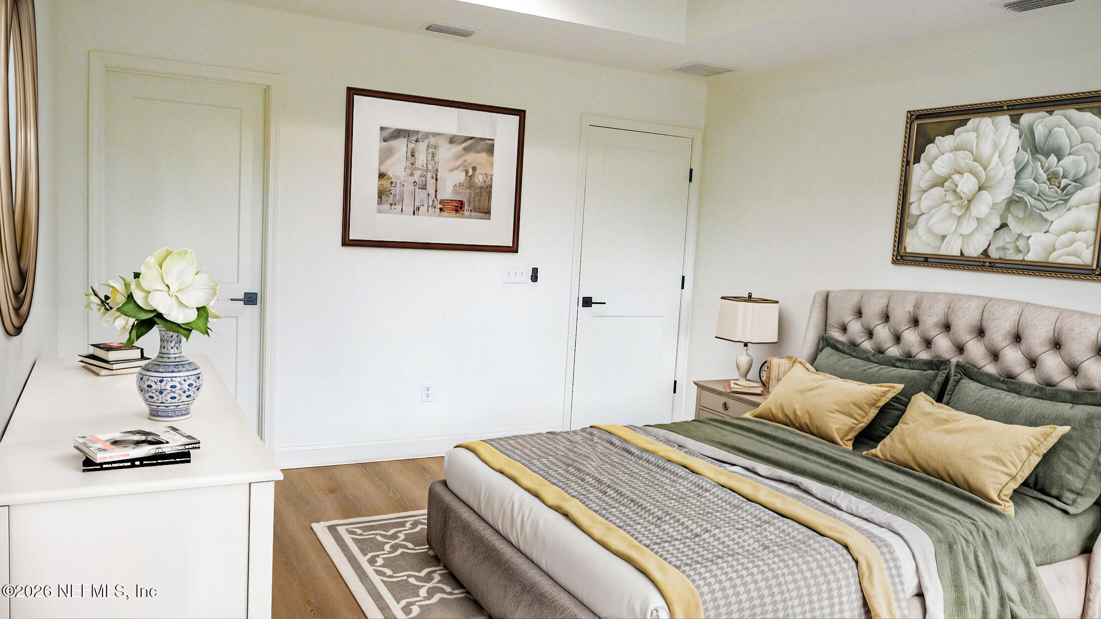 8685 Odis Yarborough Road Glen St. Mary, FL 32040 - Photo 21 of 59 a bedroom with a bed and a painting on the wall