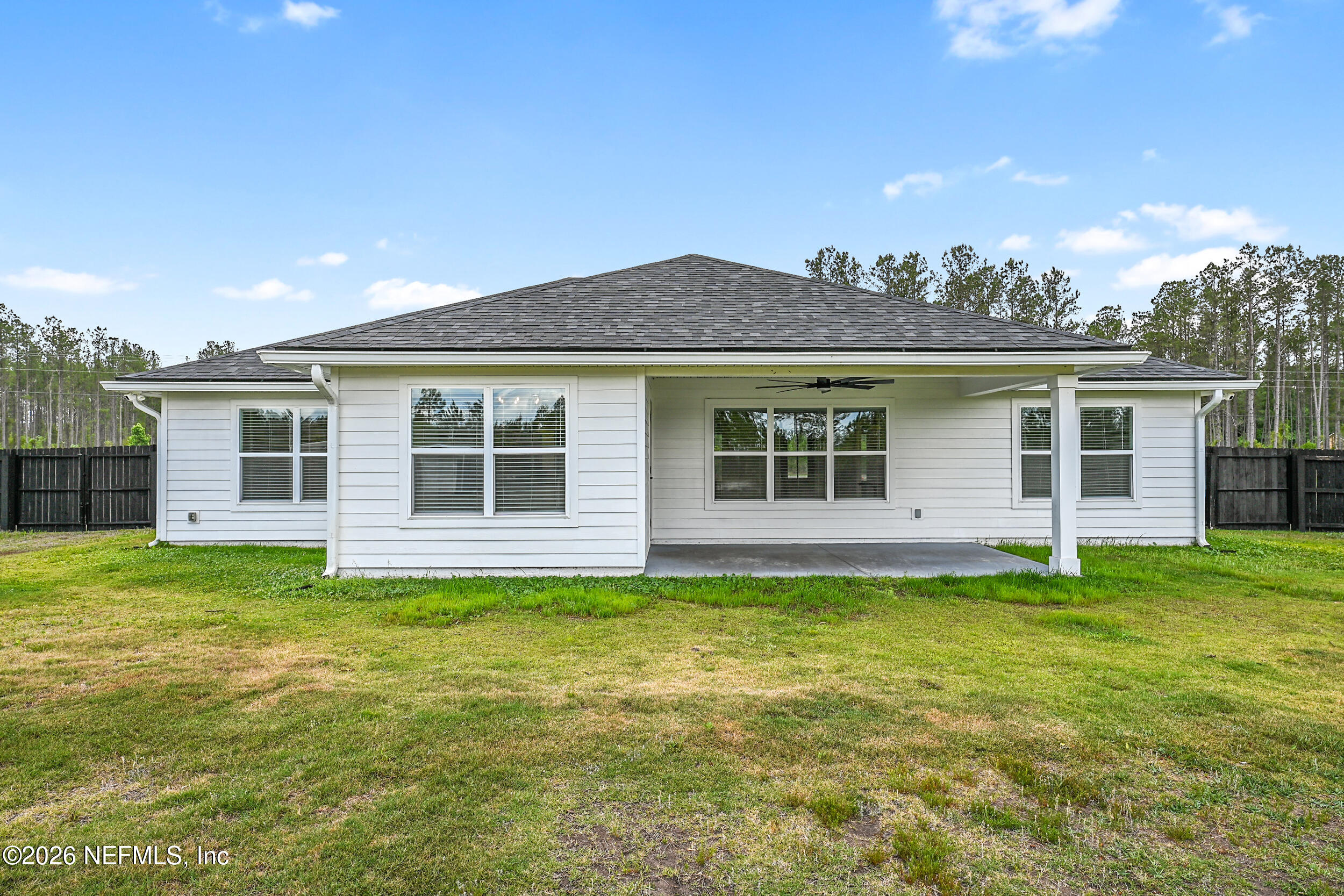 8685 Odis Yarborough Road Glen St. Mary, FL 32040 - Photo 48 of 59 a view of a house with a backyard