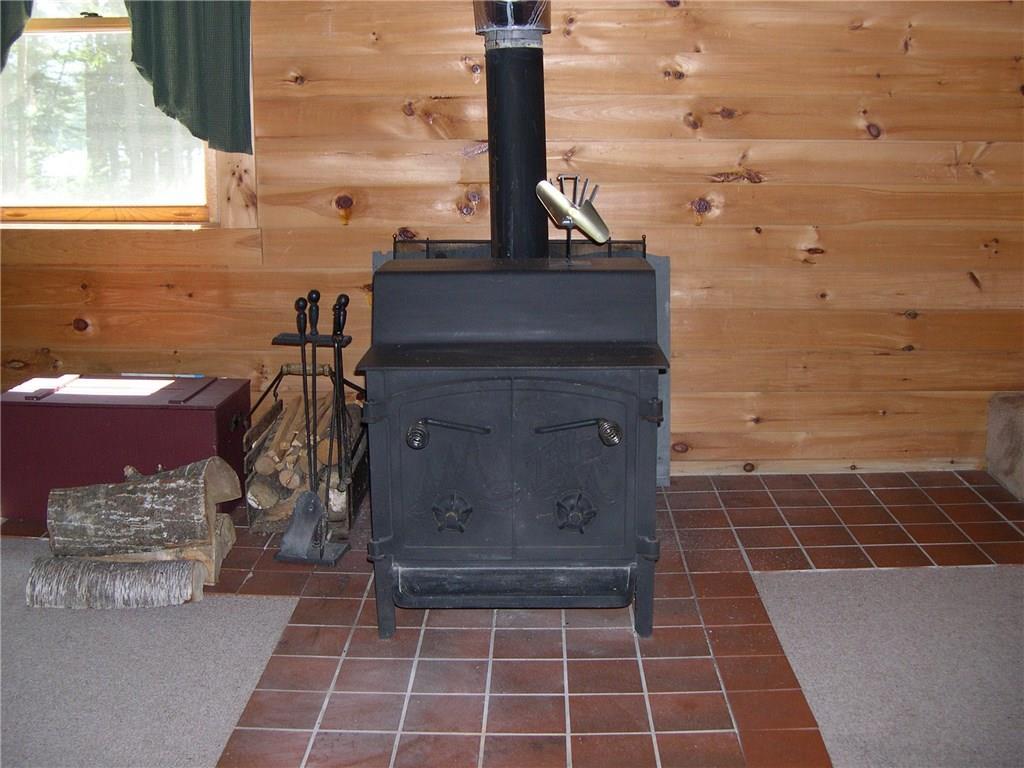 Lot 28 South Dike Road Oquossoc, ME 04964 - Photo 8 of 30 large wood stove for heat
