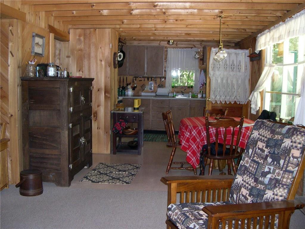 Lot 28 South Dike Road Oquossoc, ME 04964 - Photo 9 of 30 living into dining area