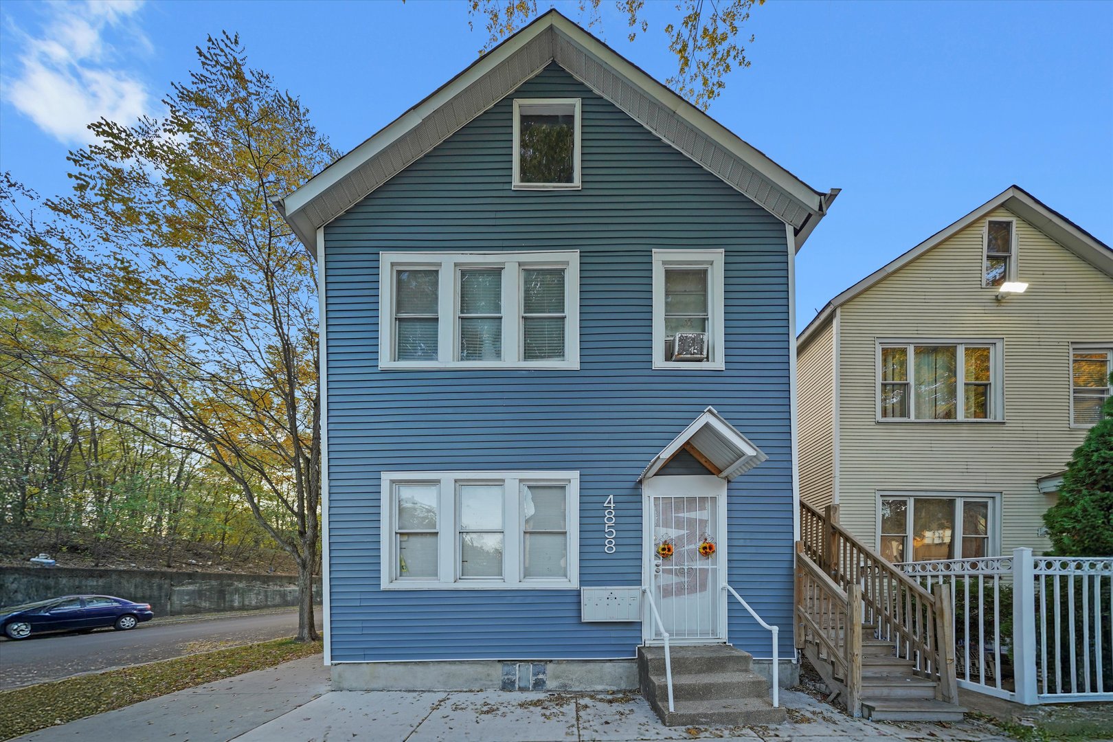 4858 South Justine Street Chicago, IL 60609 - Photo 20 of 20 a front view of a house with a yard