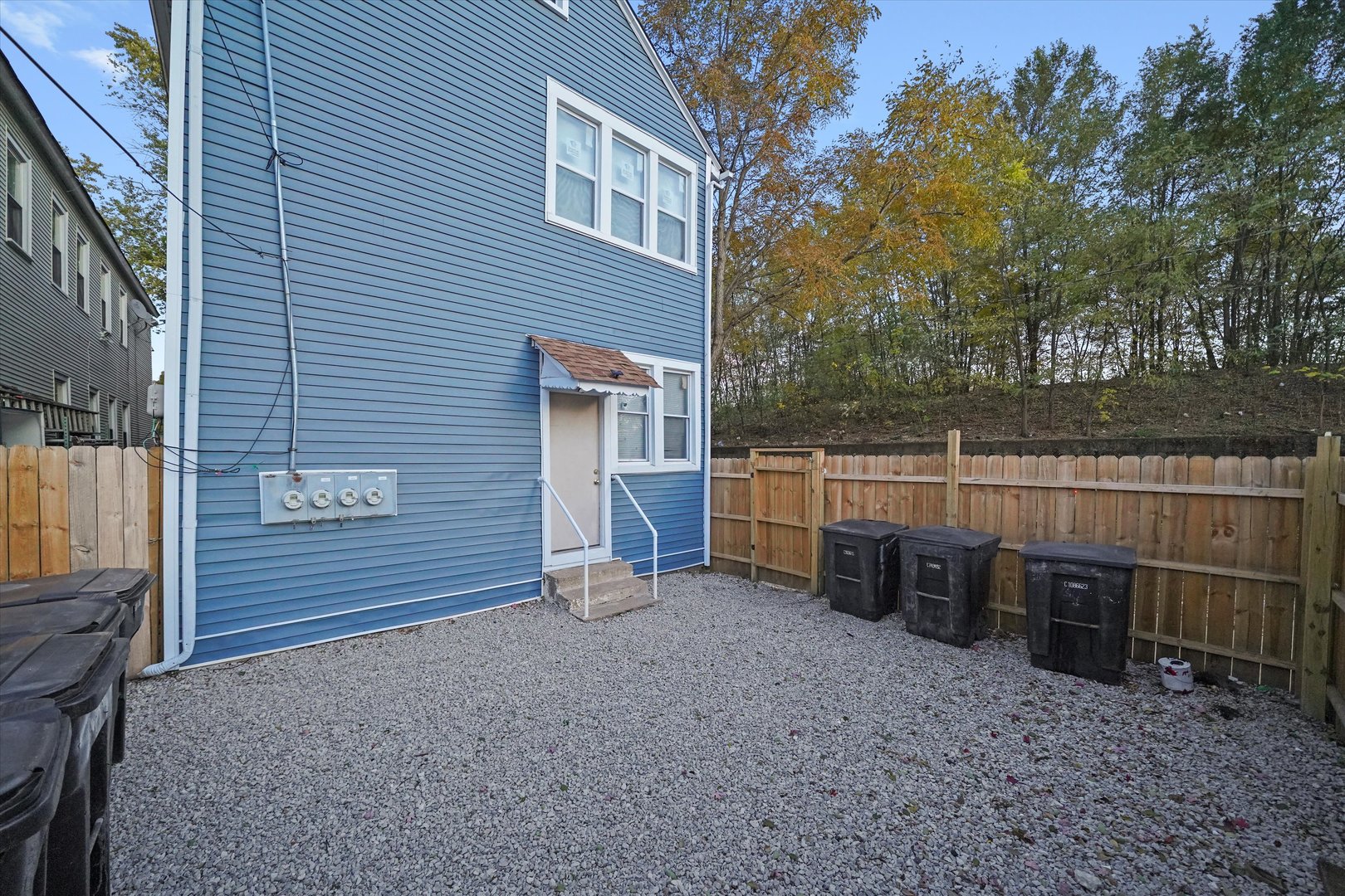 4858 South Justine Street Chicago, IL 60609 - Photo 9 of 20 a view of a house with a backyard