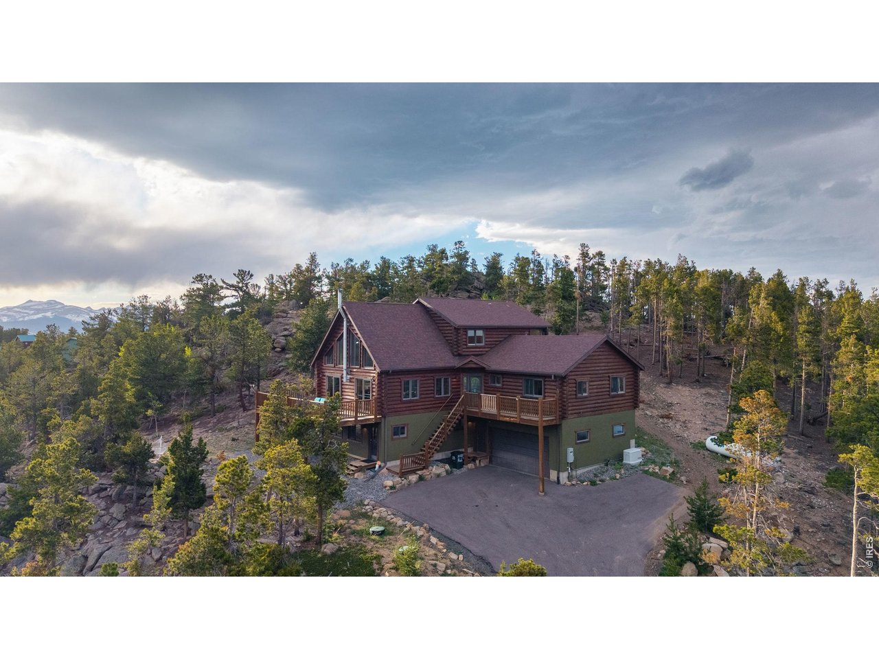 1028 Rudi Lane Golden, CO 80403 - Photo 42 of 46 a aerial view of a house with a yard basket ball court and a fountain