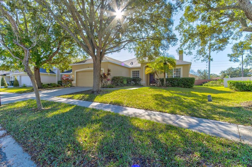 276 Longhirst Loop Ocoee, FL 34761 - Photo 2 of 60 a view of a house with swimming pool and a big yard