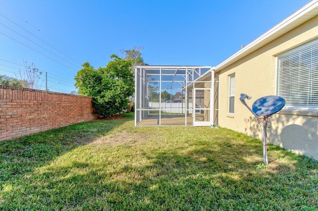 276 Longhirst Loop Ocoee, FL 34761 - Photo 42 of 60 a house view with a garden space