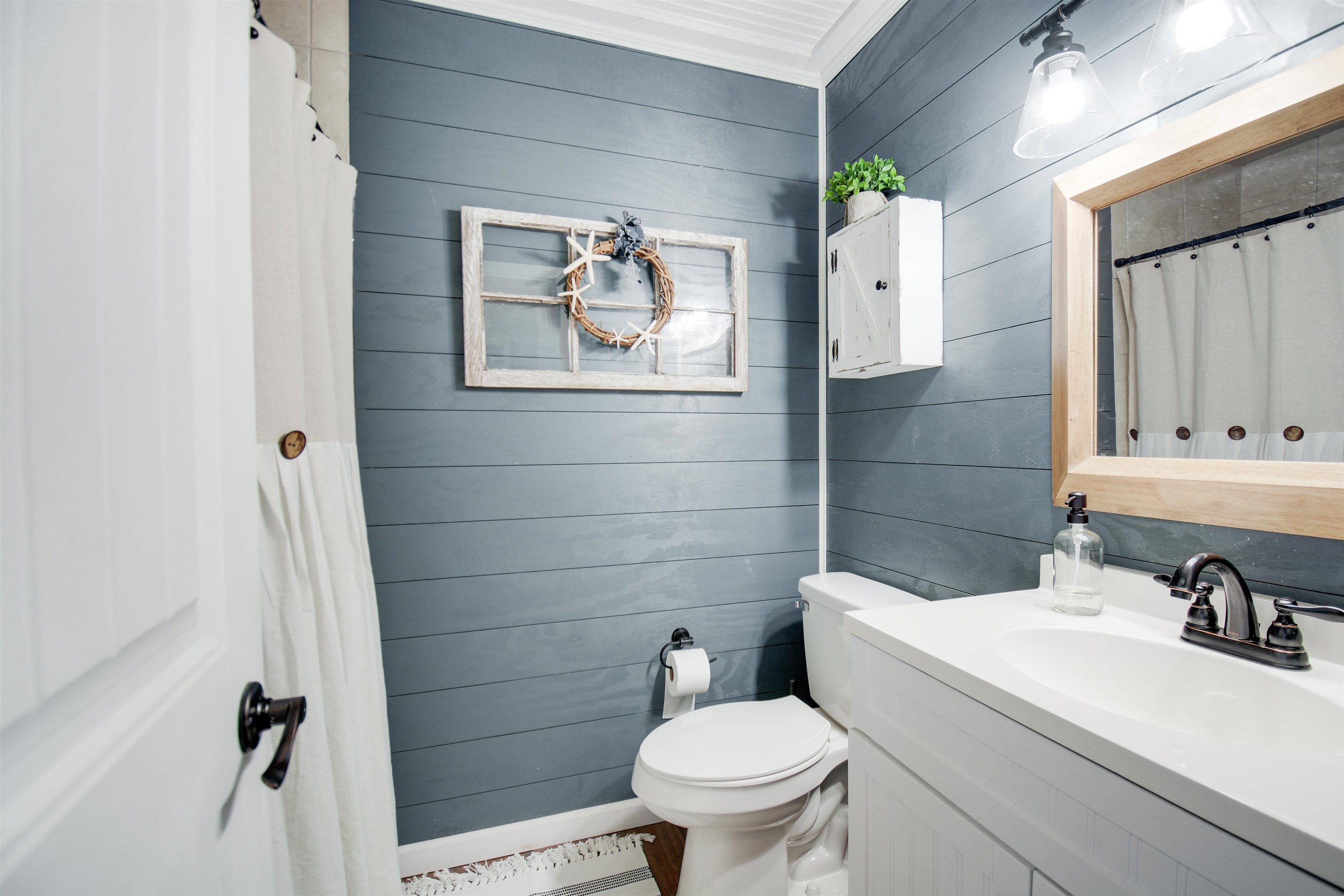 156 Egret Road St. Augustine, FL 32086 - Photo 19 of 44 a bathroom with a sink toilet and shower