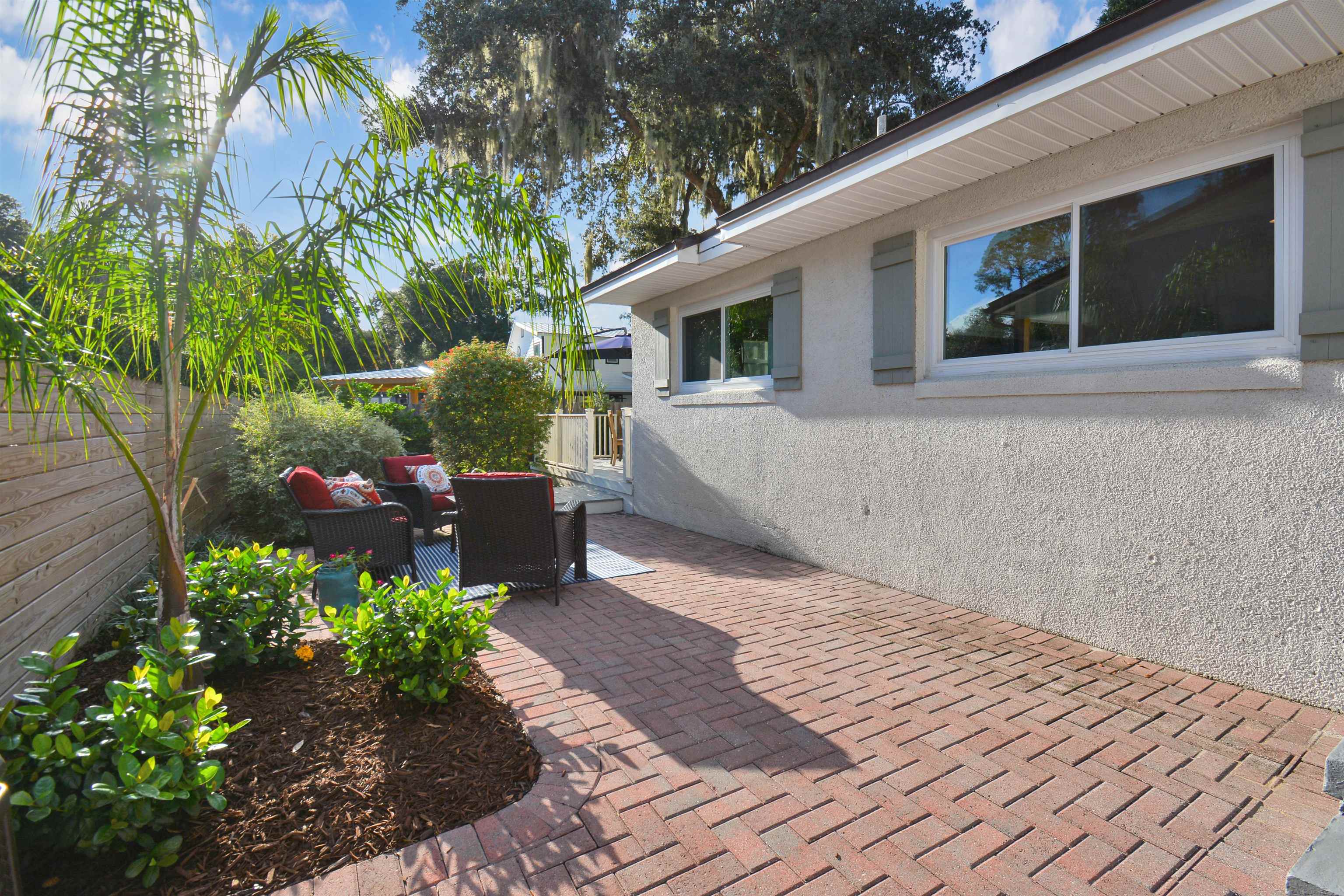 156 Egret Road St. Augustine, FL 32086 - Photo 22 of 44 a front view of a house with a yard