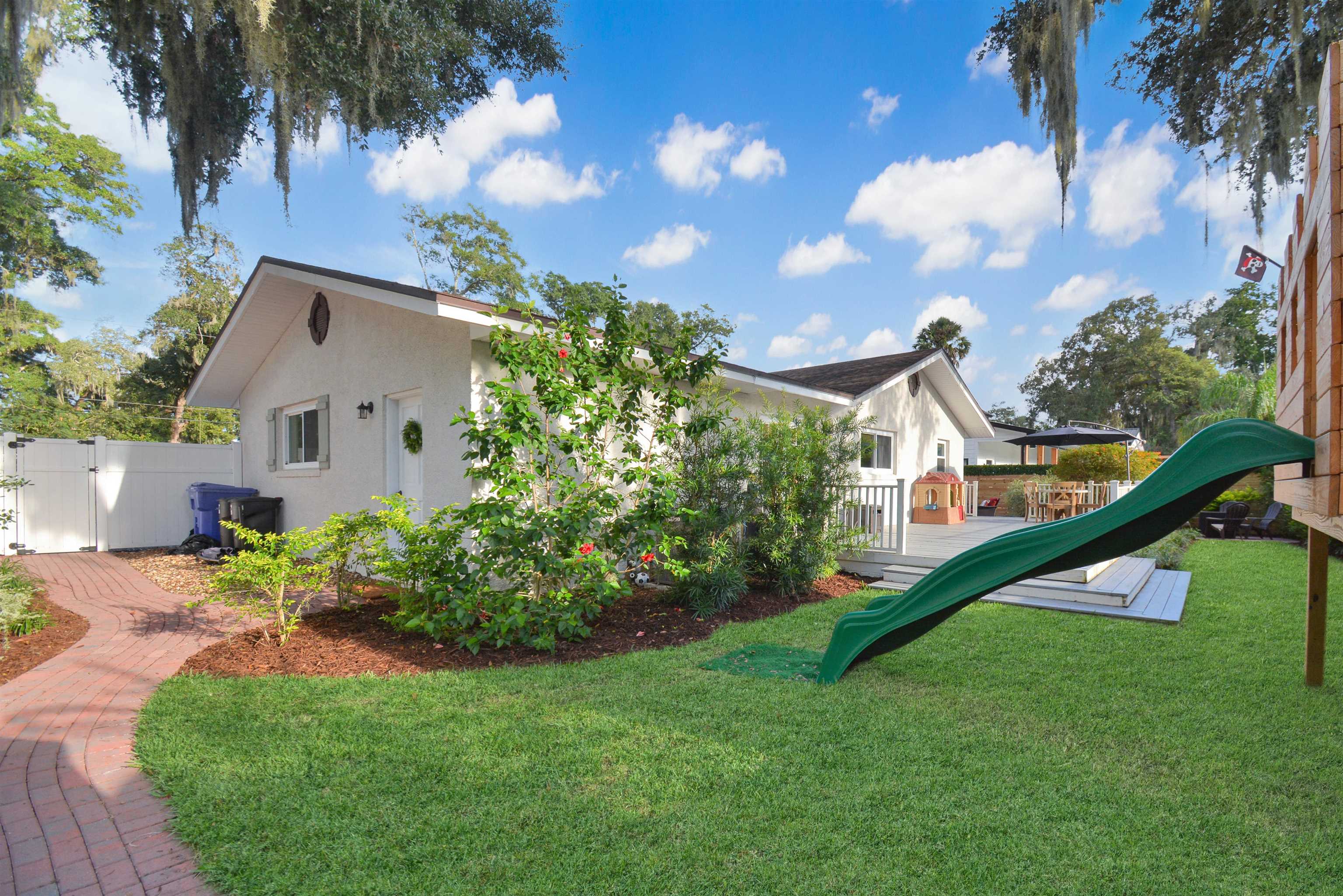 156 Egret Road St. Augustine, FL 32086 - Photo 30 of 44 a front view of a house with a yard