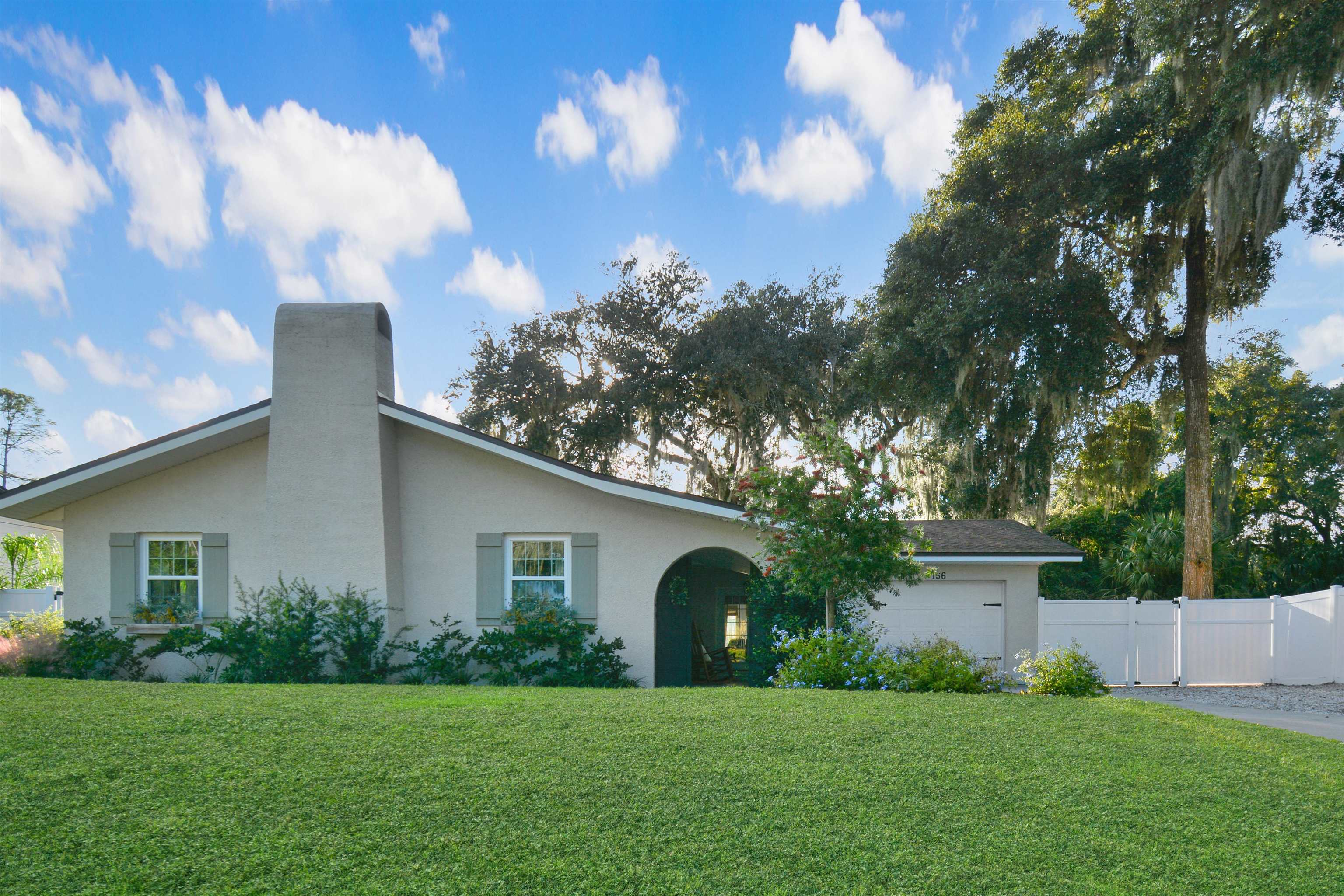 156 Egret Road St. Augustine, FL 32086 - Photo 39 of 44 a front view of house with yard and green space