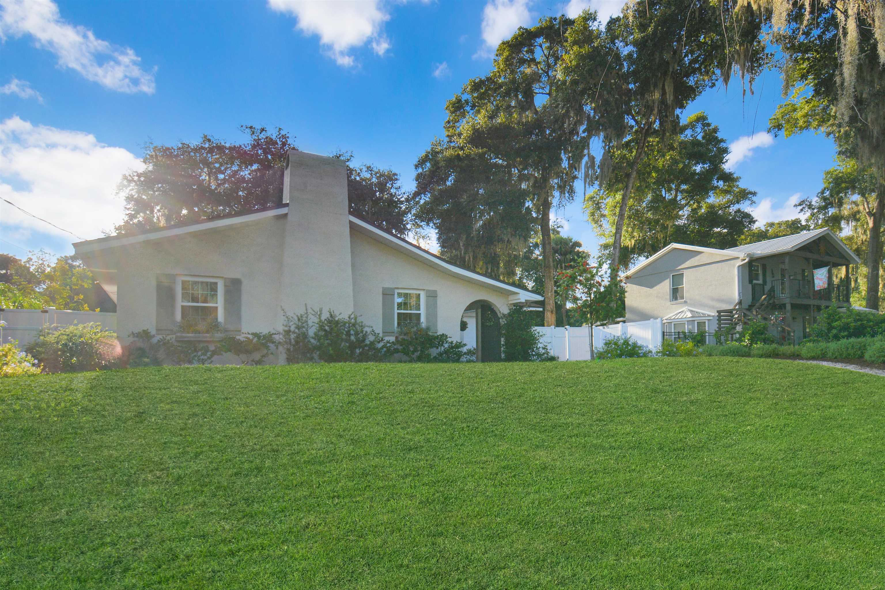 156 Egret Road St. Augustine, FL 32086 - Photo 41 of 44 a house view with a garden space
