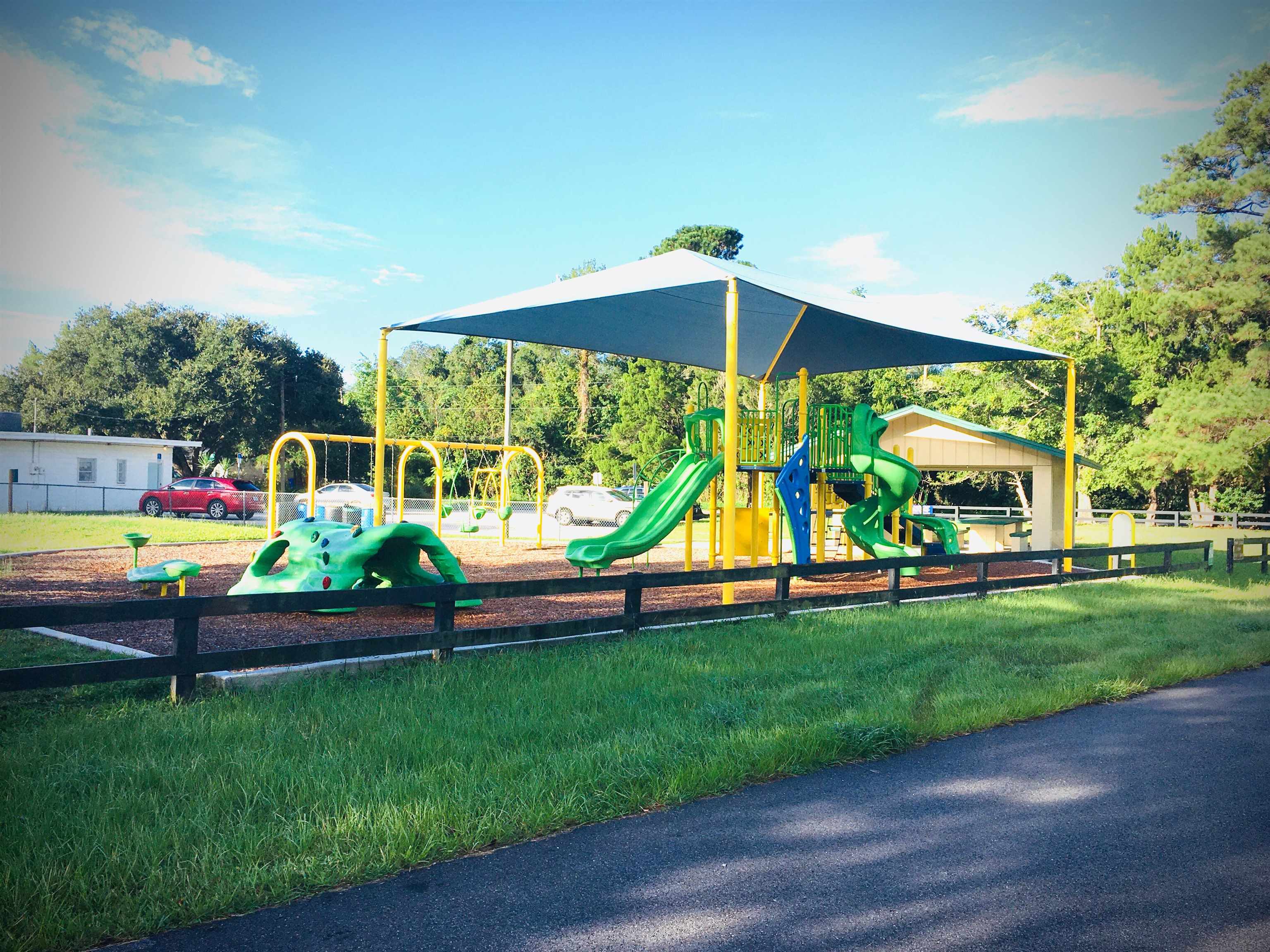 156 Egret Road St. Augustine, FL 32086 - Photo 43 of 44 a childrens park with lots of swings and slides