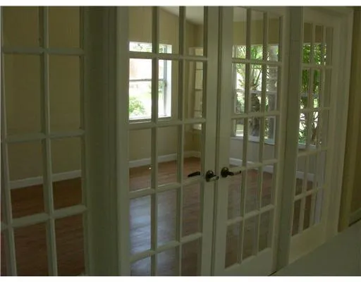 a view of a golf course with a lake