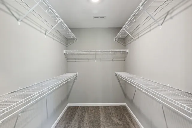 a view of a room with racks on the wall