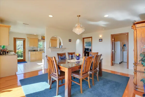 a view of a dining room with furniture
