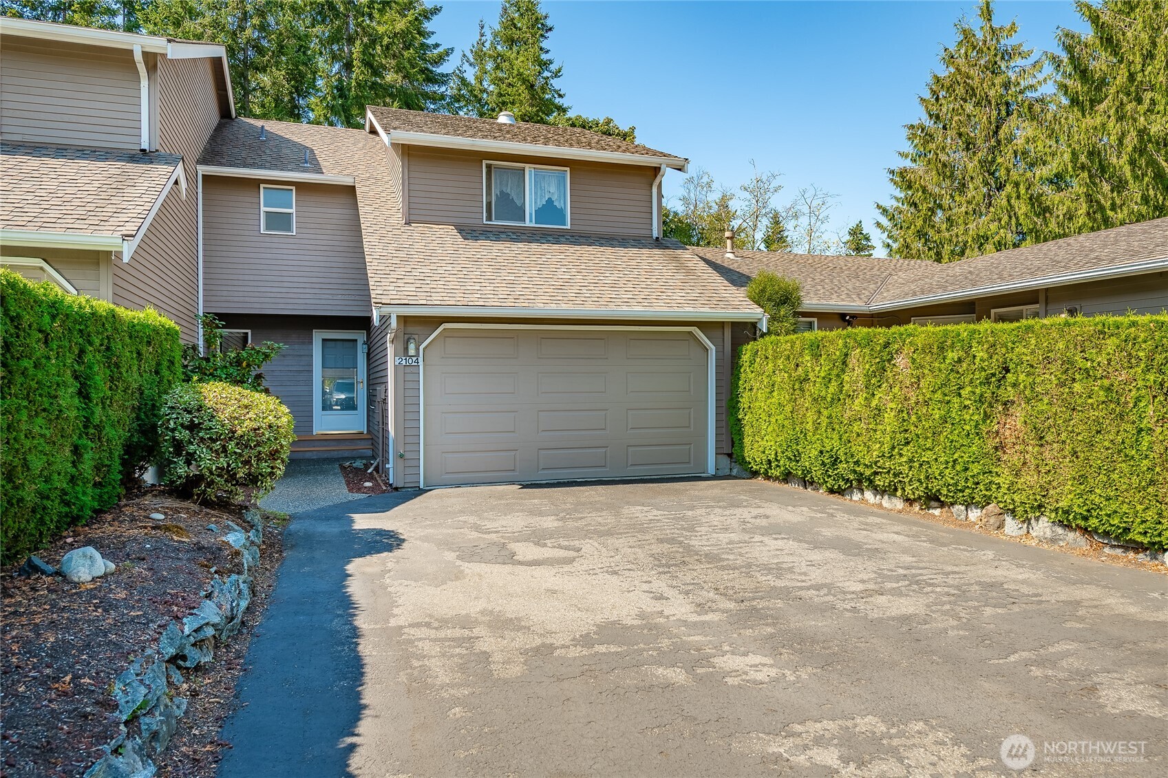 2104 Birch Circle Bellingham, WA 98229 - Photo 1 of 40 a front view of a house with garden