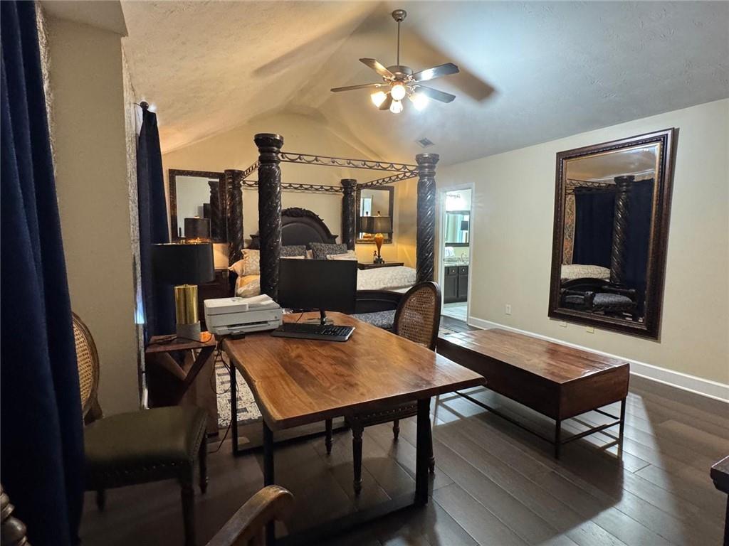 29 Lighthouse Drive Winder, GA 30680 - Photo 18 of 33 a living room with furniture a chandelier and a table