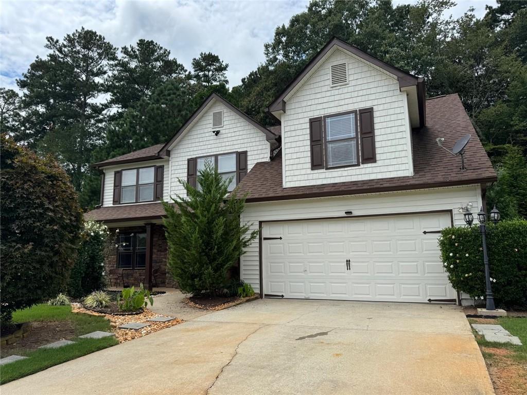 29 Lighthouse Drive Winder, GA 30680 - Photo 2 of 33 a front view of a house with garden